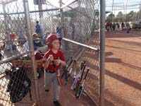10-Kenny_heads_out_to_bat