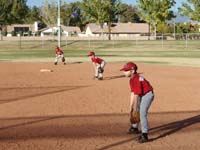 13-Dawson_at_shortstop,Kenny_at_second_base,Gavin_at_first_base