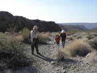 38-Poppy,Kenny_and_Baba_hiking_up_wash-Baba_was_a_trooper-toughest_hike_for_her