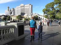 23-ah_how_cute-Kenny_holding_hands_with_Mommy_on_The_Strip