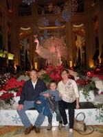 27-Grandpa_Duke,Kenny,Grammy_with_holiday_display_at_Palazzo