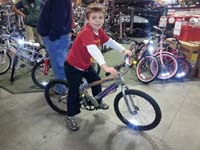 39-stumbled_across_Kenny's_dream_bike_in_REI-gift_from_Baba_for_Christmas-he_loves_this_bike