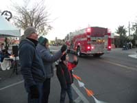 21-Poppy,Baba,and_Kenny_waiving_at_the_firemen