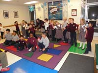 25-class_performing_Rockin'_Around_the_Christmas_Tree