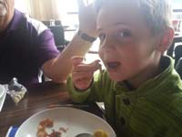 24-WOW-Kenny_is_actually_eating_calimari-he_really_liked_it_and_ate_a_lot