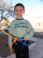 39-Kenny_in_webbing_harness-wanted_to_practice_after_not_liking_being_pulled_by_rope_on_hike