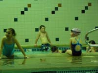 52-Kenny's_a_stud-he's_hanging_out_(flurting)_with_the_girls_in_the_hot_tub_before_the_swim_meet