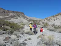 42-Toby,Mommy,Kenny_in_wash_on_way_to_car-Joel_went_along_ridgeline_to_right