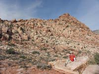 02-Kenny_posing-he_thinks_that_is_the_peak_up_there-high_point_of_area_a_little_further