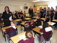 17-Kenny_and_his_first_grade_class-presenting_their_science_fair_project