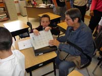 31-Kenny_shows_Baba_what_is_in_his_desk