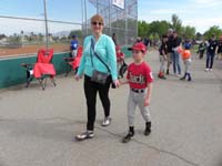 01-Mommy_and_Kenny_holding_hands_on_the_way_to_the_opening_ceremonies_staging_area