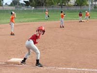 35-thumbs_up_from_Kenny_on_third_base_ready_to_run_home