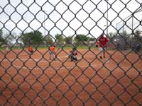 41-Kenny_playing_catcher-turns_to_smile_at_Mommy