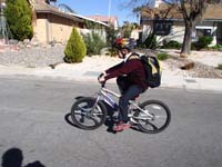 16-he_really_likes_riding_his_bicycle_home_from_school
