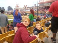 34-Mommy_and_Kenny_at_51's_game-Daddy's_work_provided_employees_season_tickets