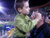 37-Kenny_having_fun_putting_peanuts_in_Daddy's_glasses