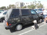 42-car_in_the_parking_lot_whose_owner_wants_people_to_write_on_it_with_chaulk