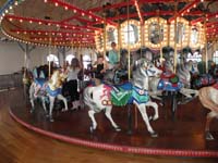 46-Kenny_and_Mommy_ride_a_carousel