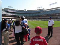 85-Kenny_walks_on_the_field_of_Dodger_Stadium