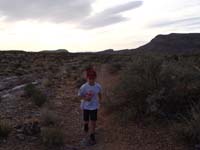 37-Kenny_running_a_trail_in_Red_Rock_with_Mommy