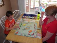66-Kenny_wanted_to_play_adult_monopoly_with_Mommy-he_won
