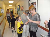 29-Kenny_is_happy_to_meet_Mommy,Baba,and_Poppy_after_the_performance