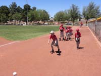 02-fielding_grounders_as_part_of_warm-up