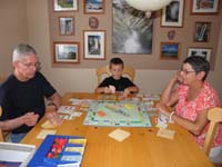 15-Kenny_wanted_to_play_Monopoly_with_Poppy_and_Baba-Poppy_won