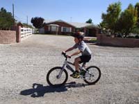 11-he_wants_to_ride_on_the_rocks-Mommy_took_the_backpack_since_hot_outside