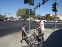 19-Kenny_and_Daddy_waiting_to_walk_bikes_across_street