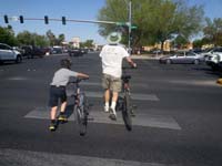 20-busy_street_so_we_walk_quickly_in_crosswalk_watching_and_hoping_all_the_cars_stop