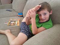 52-playing_around_trying_to_put_him_leg_over_his_head