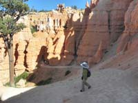 34-hiking_down_trail-doorway_through_hoodoo_ahead