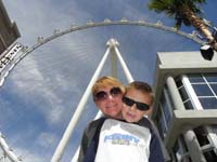 46-Mommy_and_Kenny_with_wheel_in_background-Daddy_laid_on_his_back_for_this_shot