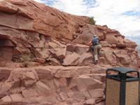 23-now_he's_really_happy_getting_to_climb_big_rocks-I_took_two_guests_up_easier_way_around_to_left