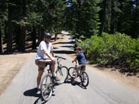 02-Daddy_and_Kenny_going_for_a_bike_ride-and_look_Daddy_is_even_wearing_a_helmet
