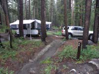 12-our_wet_campsite-good_rain_and_that_hump_is_gone-easy_for_truck-bad_for_camper
