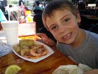 014-Kenny_really_liked_the_shrimp_after_Mommy_peeled_them-ate_as_quick_as_she_peeled