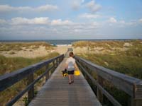 018-boy_on_the_way_to_play_at_the_beach-first_time_in_Atlantic_Ocean