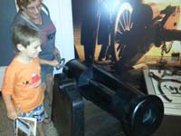 040-checking_out_the_museum_exhibits-working_on_his_junior_ranger_program