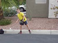 26-catching_ground_balls_in_the_street