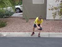 28-catching_ground_balls_in_the_street