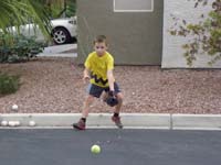 30-catching_ground_balls_in_the_street