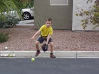 31-catching_ground_balls_in_the_street