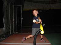 42-hitting-looks_happy_he_hit_the_tee_and_not_the_ball