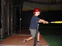 43-hitting-he_sure_looks_surprised_he_hit_the_ball_well