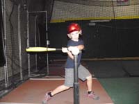45-hitting-he_is_really_concentrating_on_the_ball