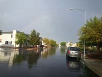 04-rainbow_and_wet_street_from_our_home-it_rained_hard_in_our_area