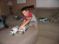 10-playing_with_the_Hess_trucks